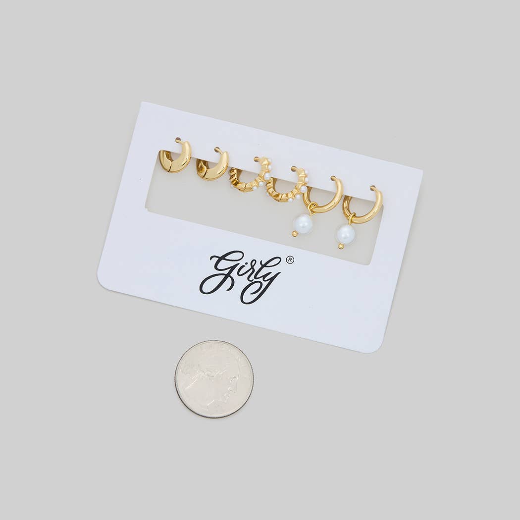 THREE PAIRS OF PEARL AND BRASS HUGGIES